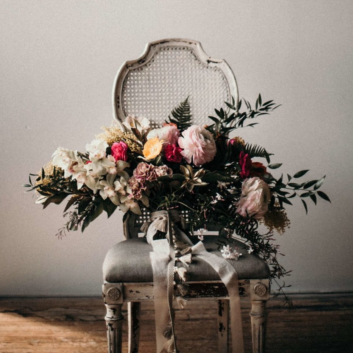 Image: Beautiful bridal floral bouquet on antique chair.